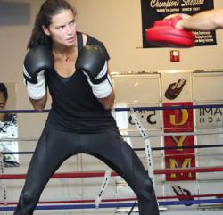 Adriana Lima hits the gym with her trainer for boxing