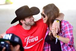 Ashton Kutcher dances like a cowboy at the Country Music Festival
