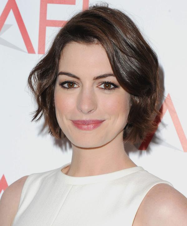 ANNE HATHAWAY IN HER “GROUNDED” PARTY