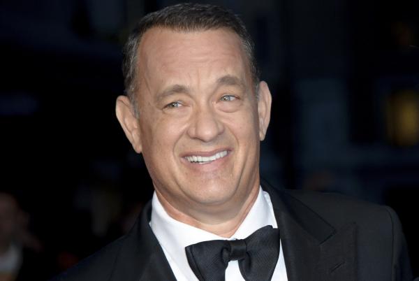 TOM HANKS PLAYS THE ROLE OF A GOOD HUSBAND